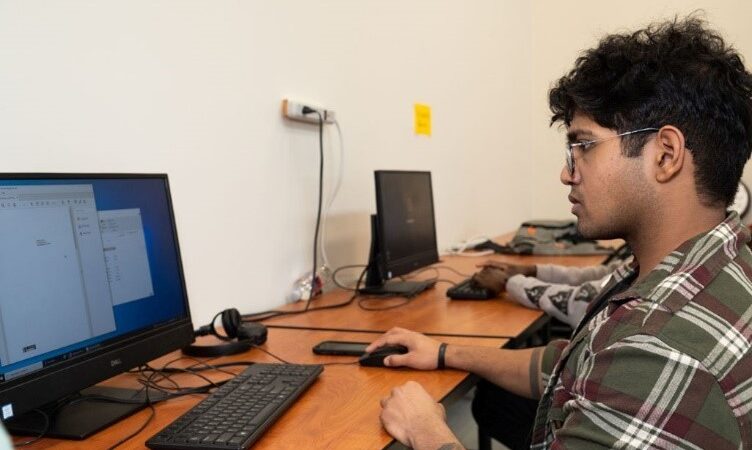 young man using a computer