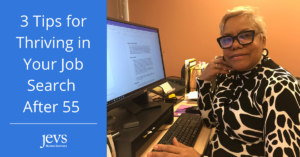 Text that says 3 Tips for Thriving in Your Job Search after 55 with image of a woman sitting by computer and looking at camera.